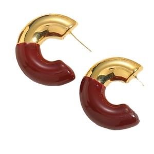 Polished gold-plated eggshell C-shaped hoop earrings with burgundy enamel glaze finish