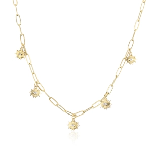 Detailed close-up of gold plated paperclip chain necklace with sun eye pendants and zircon