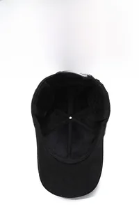 Detail view of winter baseball cap with warm fleece lining and quilted ear flaps