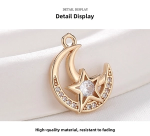 Detailed close-up of gold moon and star pendant with cubic zirconia for jewelry making