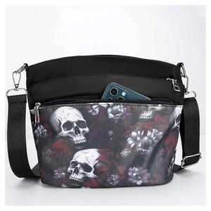 Detail of gothic skull and floral print crossbody bag with phone in front pocket