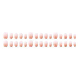 Peach ombre press-on nails with soft cinnamon nude gradient and jelly glossy finish