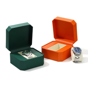 Premium PU leather octagonal watch boxes in green and orange with silver luxury timepieces