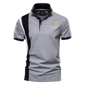 Men's grey short sleeve polo shirt with black and white side contrast and chest embroidery