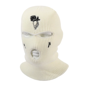 Three-hole knitted balaclava ski mask in cream white with rose embroidery detail