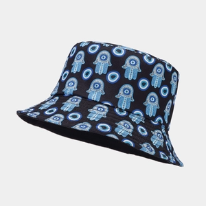 Detail of Hamsa and Evil Eye print on vintage reversible cotton sun bucket hat