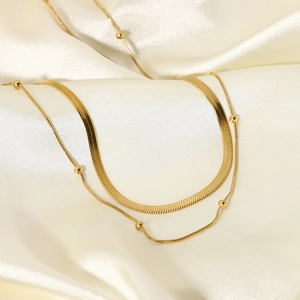 Double-layered 14K gold plated necklace with flat snake chain and beaded station link