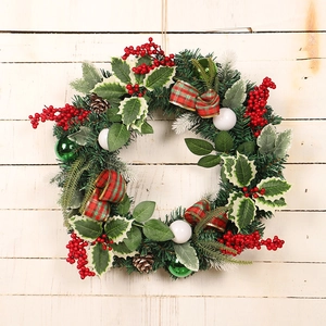 Illuminated 50cm Christmas wreath with red berries and tartan bow on a wood wall