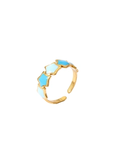 Detail of 18k gold plated ring with blue and white enamel star patterns and open band