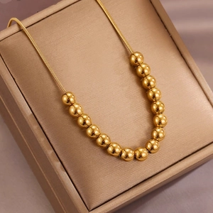 Elegant gold bead snake chain necklace for women with polished spherical accents