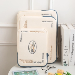 Vertical striped cream tablet sleeve with blue trim and vintage embroidery for iPad