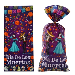 Flat and filled purple Dia De Los Muertos plastic candy bags with skull pattern