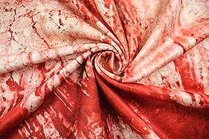 Detailed close-up of marble print fabric showing smooth texture and drapes of the A-line dress
