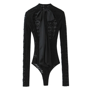 Elegant black lace long sleeve bodysuit featuring a large satin bow on back cutout
