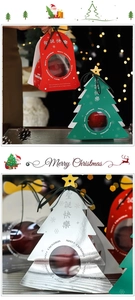 Detailed Christmas apple gift boxes with star toppers in festive red, green and silver