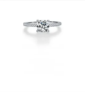 Detail of square-cut moissanite ring with S925 hallmark and pavé setting on silver band