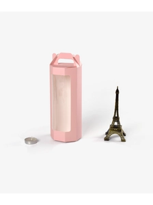 Detailed view of pink octagonal gift box with transparent window and handle for wine glass