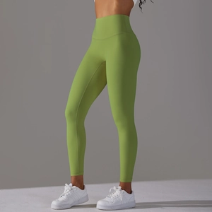 Side view of avocado green high-waisted yoga pants showcasing elastic compression fit