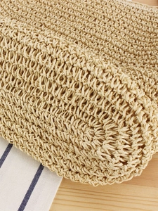 Handmade woven paper straw shoulder bag with knot strap and navy style beach design