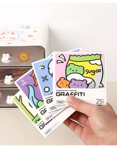 Detail view of mini 25-page cartoon graffiti coloring book sets for kids' travel
