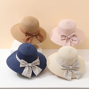 Chapeaux de paille pour femmes en quatre couleurs avec rubans à fleurs et larges bords