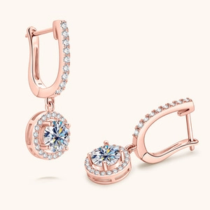Detail view of S925 sterling silver stamp on rose gold moissanite earrings