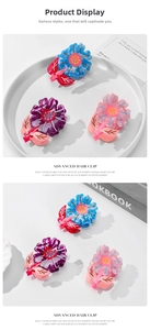 Macro detail of sunflower acetate hair claws in jelly blue, purple, and pink colors