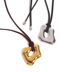 Irregular liquid metal hollow pendants in gold and silver with black leather cords