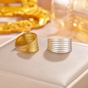 Adjustable layered wave stainless steel rings in gold and silver finish set