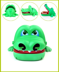 Detail shots showing the green crocodile biting toy with close-up of teeth and mechanism