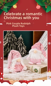 Close-up of pink Christmas gnome dolls with sequins and knit details for holiday decor