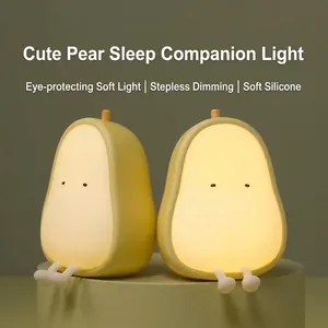 Pear-shaped LED night light in yellow silicone with stepless dimming for kids' bedroom