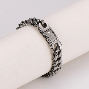Bracelet pour homme en acier argenté vintage avec motifs gravés et fermoir pliant
