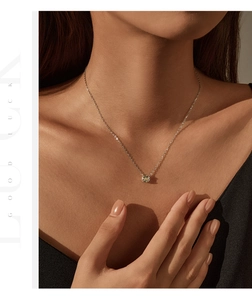 Close-up of octagon yellow rose-cut zircon necklace on neck showing elegant details