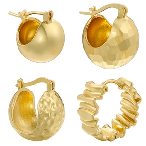 Detail of gold plated hoop earrings with smooth, hammered, and geometric textured surfaces