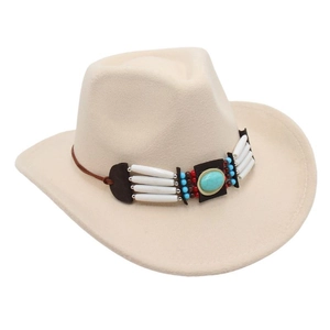 Detail of cream western cowboy hat with turquoise and beaded ethnic style decorative band