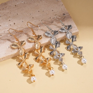 Elegant gold and silver flower drop earrings with brushed metal petals and white pearls