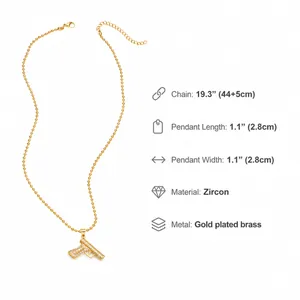 Detailed size chart for gold-plated submachine gun pendant with cubic zirconia stones
