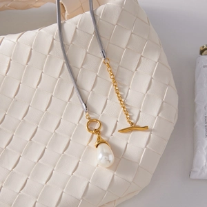 Vintage stainless steel mixed chain necklace with teardrop pearl and OT clasp closure