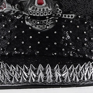 Punk captain hat detail with skull emblem, black sequins and sharp silver metal rivets