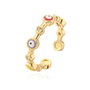 Close-up of gold-plated evil eye ring with colorful enamel and sparkling zircon accents