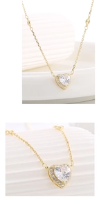 Macro detail of a heart-shaped zircon necklace pendant with sparkling halo diamonds