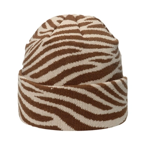 Macro shot of brown and white tiger-patterned knit beanie showing detailed soft texture