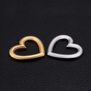 Pair of hollow heart-shaped stainless steel pendants in gold and silver mirror finish