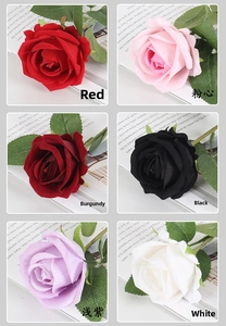 Detailed view of artificial velvet roses in six colors including red and burgundy shades