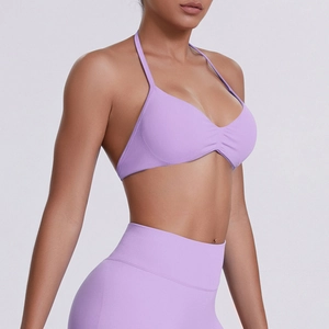 Detail view of the seamless lavender halter sports bra with ruched gathering design