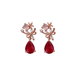 Elegant rose gold drop earrings with pink flower bow and red teardrop crystal