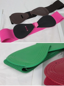 Close-up of elastic waist belt stitching and premium leather texture in multiple colors