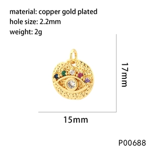 Detailed macro view of a 15mm gold-plated evil eye pendant with colorful zirconia