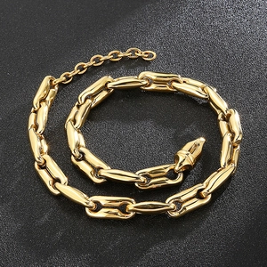 Detail of gold coffee bean link chain bracelet with lobster clasp and extension chain